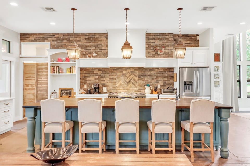 Linger over morning coffee or casual meals at the island