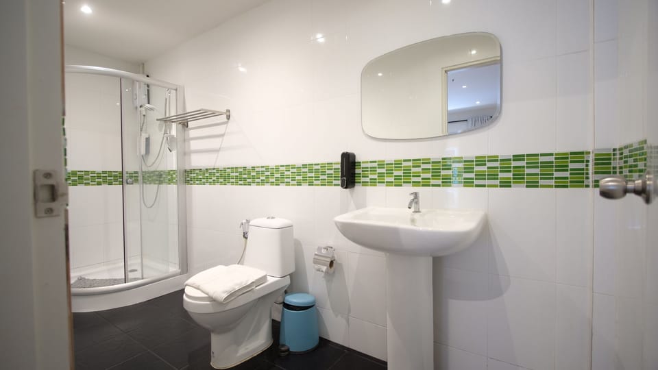 Standard Quadruple Room, Pool View | Bathroom | Shower, free toiletries, hair dryer, bidet