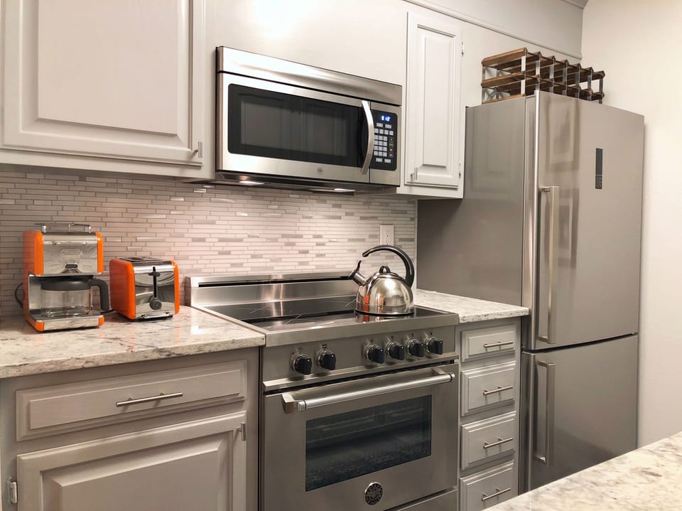 Kitchen. Induction range cooks much faster than regular electric one