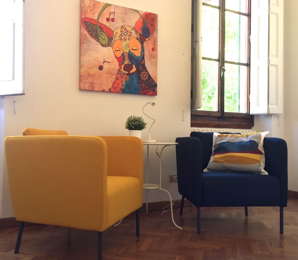 Basic Apartment, 4 Bedrooms | Living area | Flat-screen TV