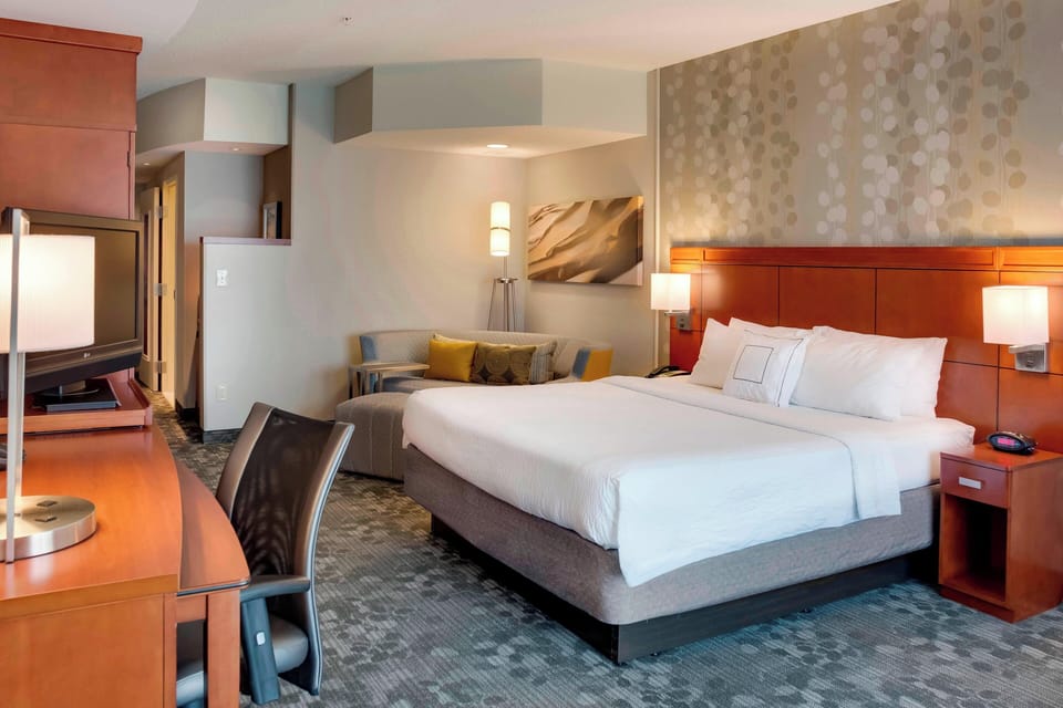 Premium bedding, pillowtop beds, desk, blackout drapes