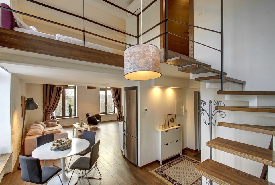 Business Loft 65 | Living area | Flat-screen TV, fireplace, pay movies