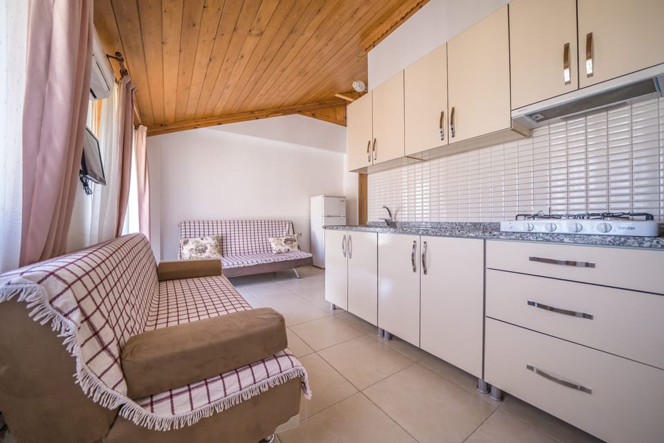 Apartment, 1 Bedroom | Living area | LCD TV
