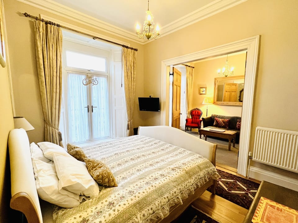 Luxury Suite, 1 Bedroom, Ground Floor. Balcony access with large bathroom.  | 1 bedroom, Egyptian cotton sheets, premium bedding, down comforters