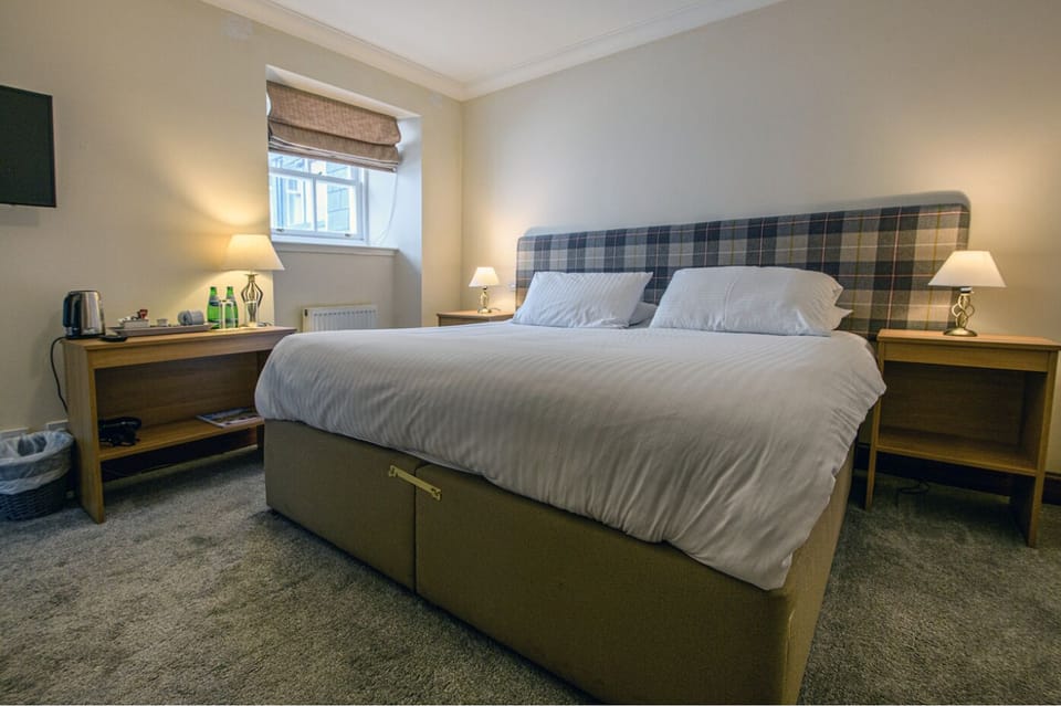 Blackout drapes, soundproofing, free WiFi, bed sheets