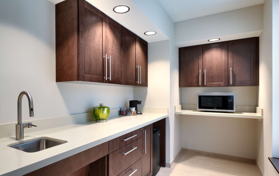 Suite, 1 Bedroom | Desk, laptop workspace, blackout drapes, free cribs/infant beds