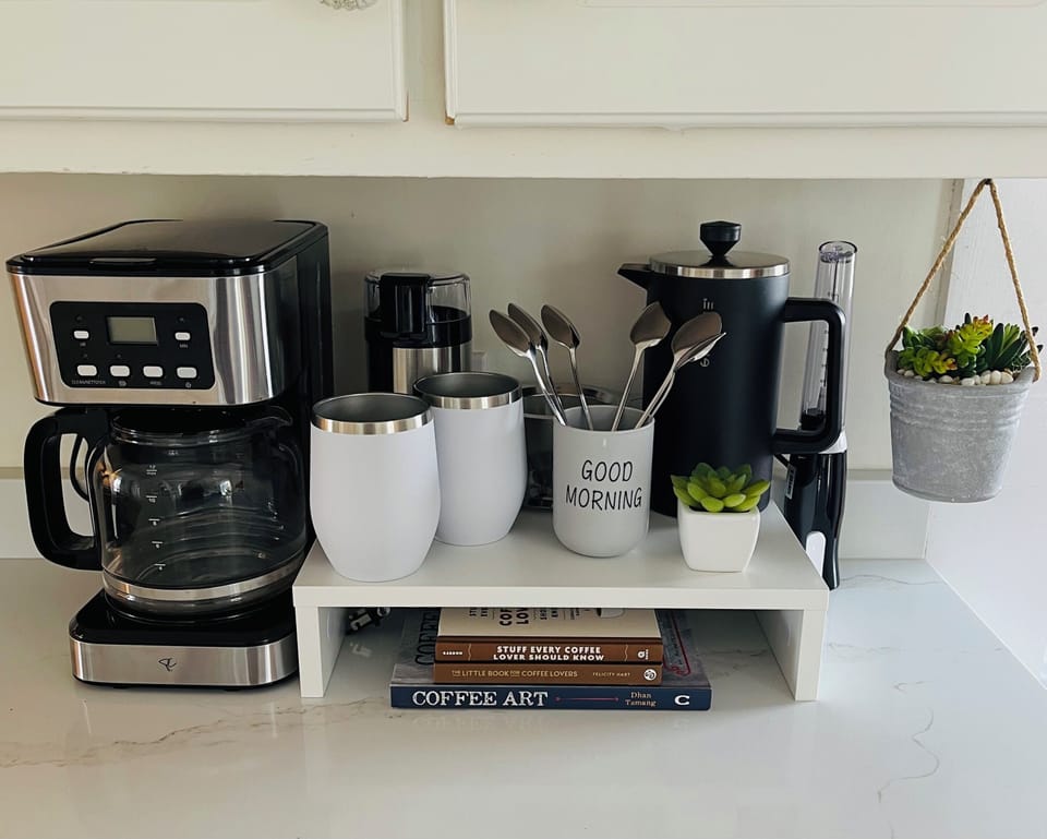 Bring out the Barista with drip coffee, French press, grinder, and frother.