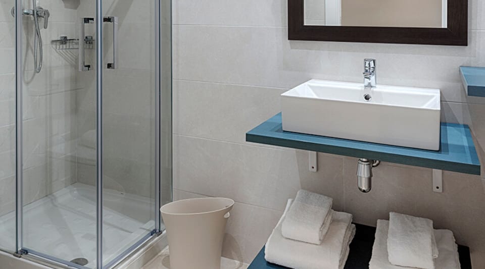 Shower, free toiletries, hair dryer, towels