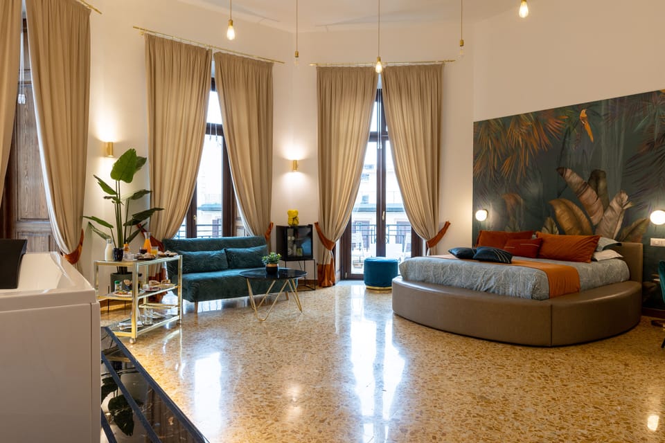 Luxury Suite, Balcony | Premium bedding, down comforters, minibar, in-room safe