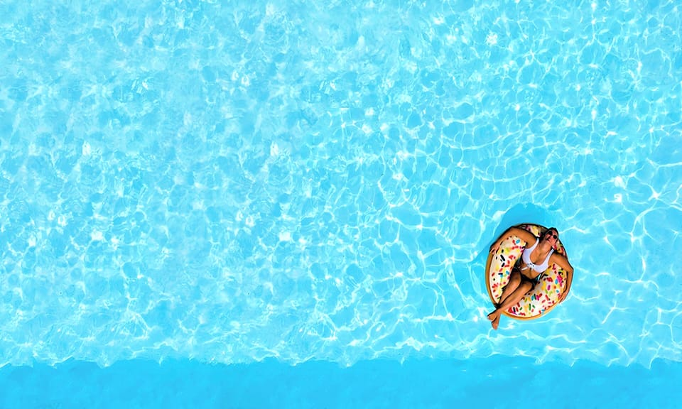 Outdoor pool, a heated pool, pool umbrellas, sun loungers