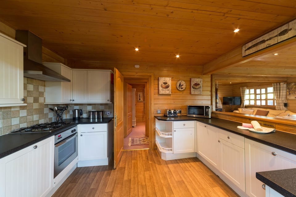 Oaks Log Cabin | Private kitchen | Electric kettle, freezer