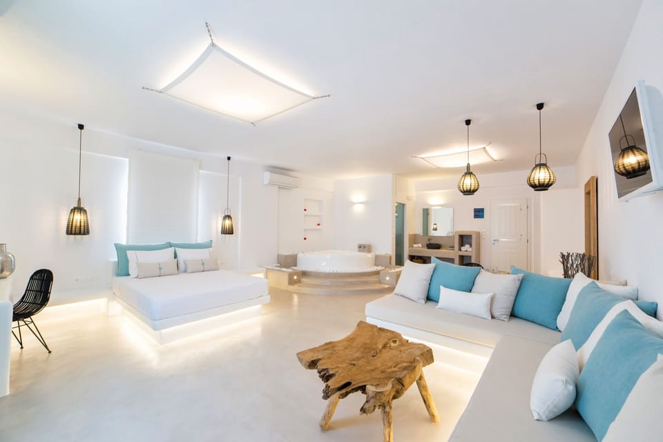 Luxury Suite, Sea View (Indoor Hot Tub) | 1 bedroom, minibar, in-room safe, individually decorated