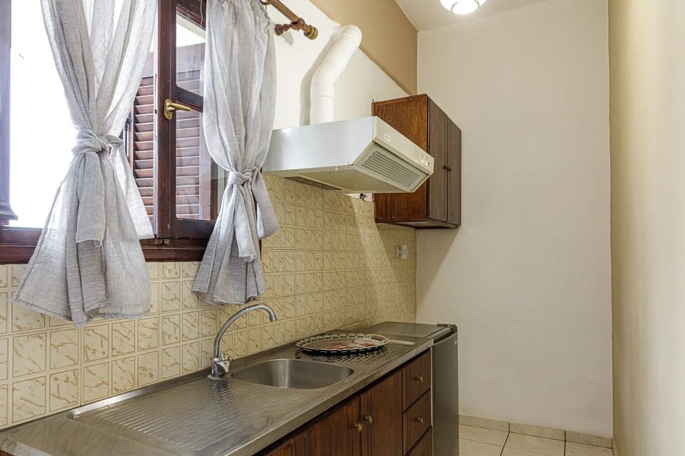 Two Bedroom Apartment with Side Sea View | Private kitchen | Fridge, stovetop, coffee/tea maker, electric kettle