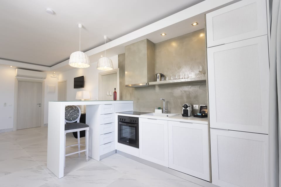 Aeolos Grand Suite with Private Pool | Private kitchen | Fridge, stovetop, espresso maker, coffee/tea maker