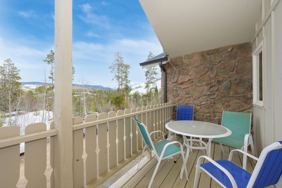 Sip your morning coffee on this peaceful balcony while taking in stunning mountain and forest views.