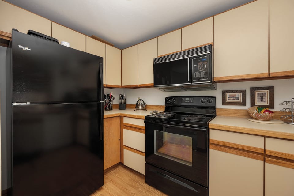 Your fully equipped kitchen features modern appliances and ample counter space for preparing memorable meals during your stay.