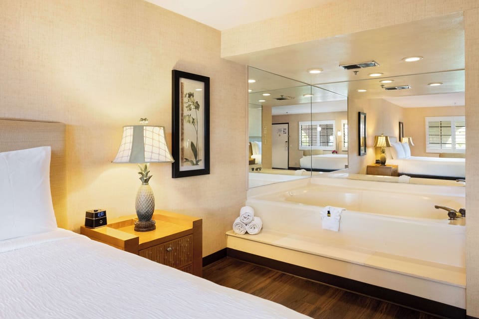 Combined shower/tub, designer toiletries, hair dryer, towels