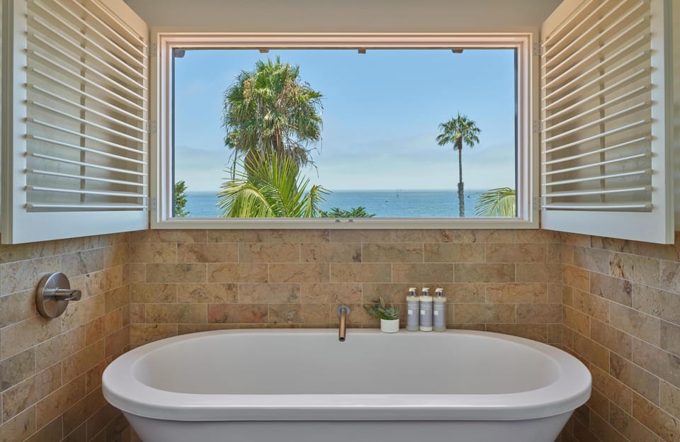 Suite, Ocean View | Bathroom | Designer toiletries, hair dryer, bathrobes, slippers
