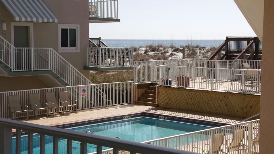 Pool and dune crossover to the beach.