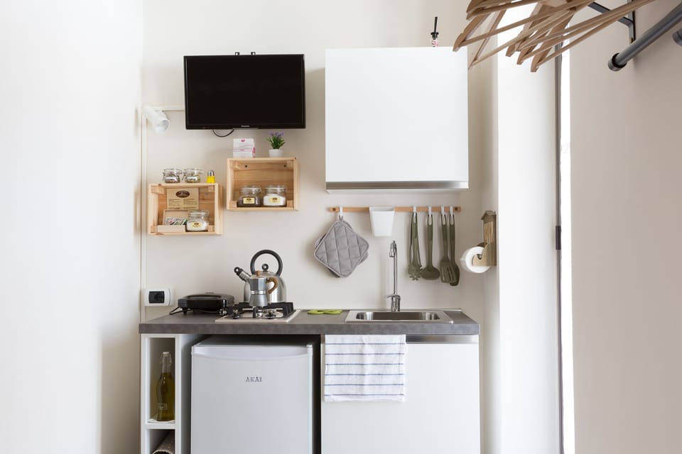 Quadruple Room | Private kitchen | Fridge, oven, stovetop, coffee/tea maker