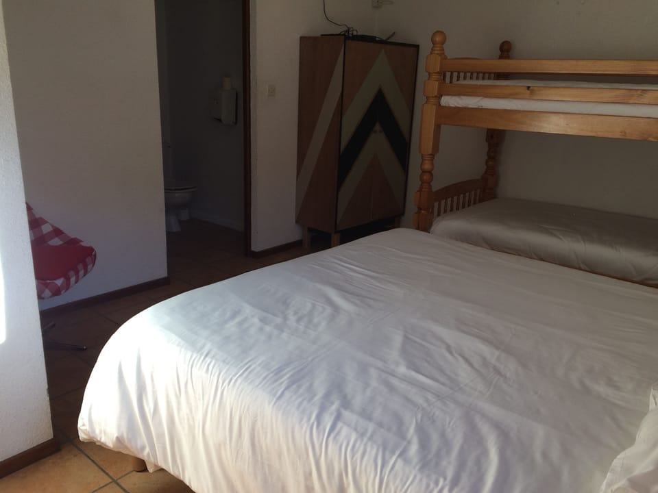 Standard Quadruple Room | Blackout drapes, bed sheets, wheelchair access