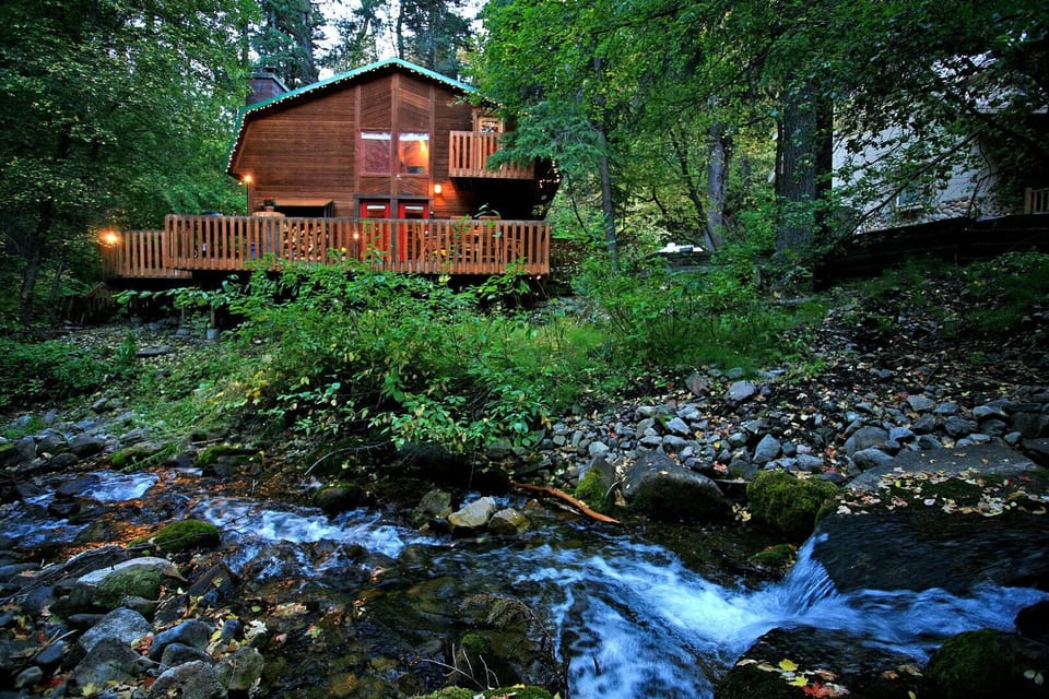 Enjoy this cabin tucked away, stream side, at the end of a private lane.