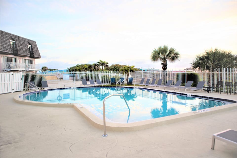 Beautiful, spacious oceanfront heated pool with a stunning view.