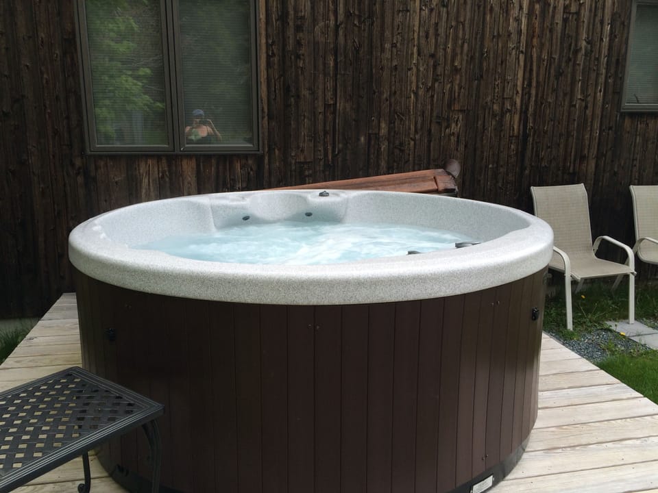 Your hot tub on the seclusive private back deck in the woods.
