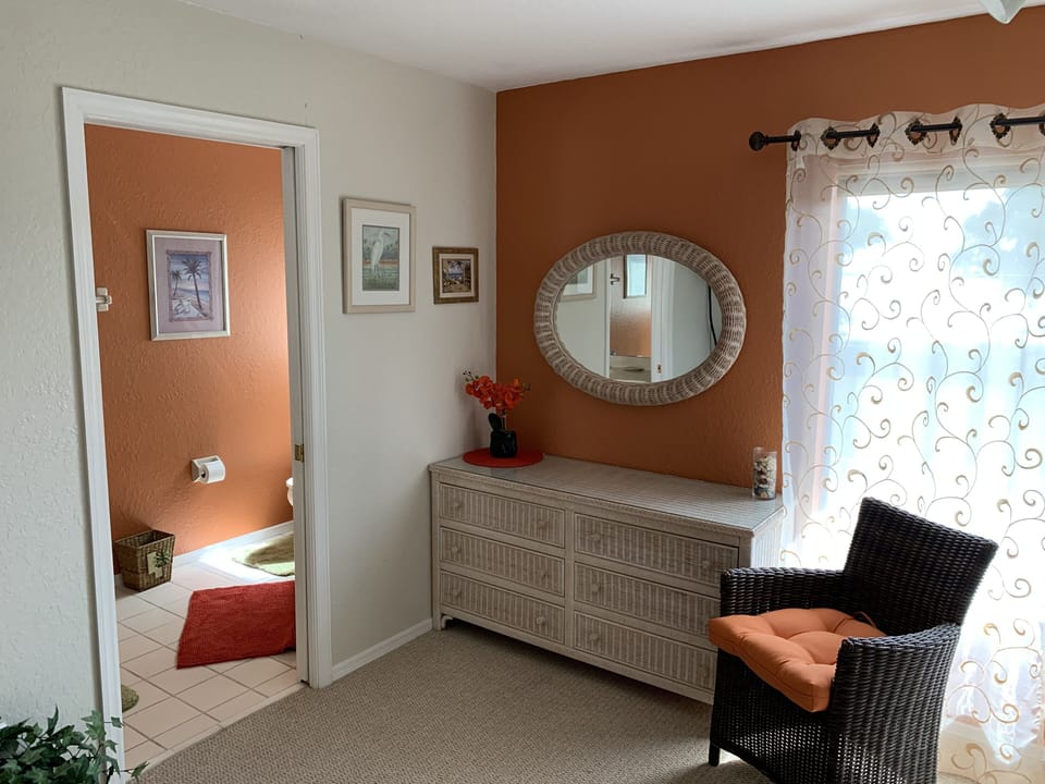 Master Bedroom dresser by the window, which has a view of Beautiful Tampa Bay.