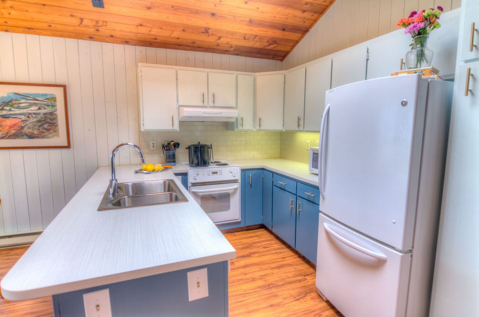 Cook up your favorite meal or just enjoy a cup of coffee from the cheery kitchen!