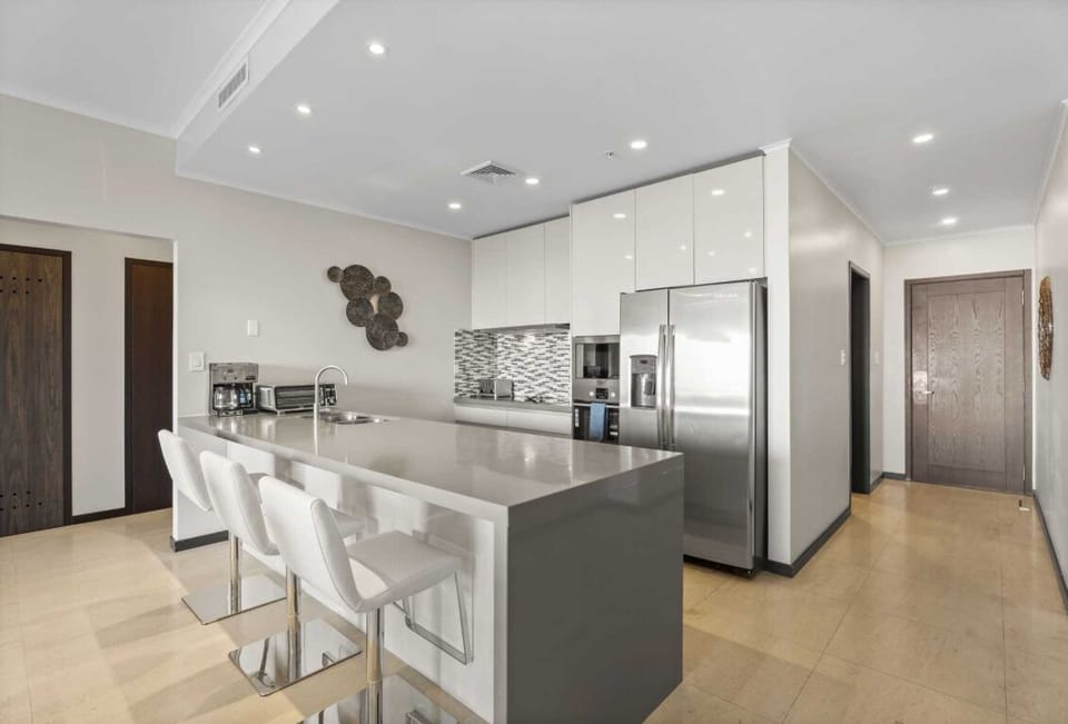 There are 4 counter stools in the fully equipped kitchen. No food included.