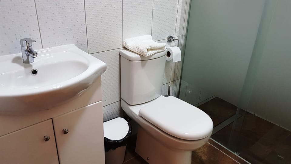 Superior Triple Room, Balcony, Partial Sea View | Bathroom | Combined shower/tub, rainfall showerhead, hair dryer, towels