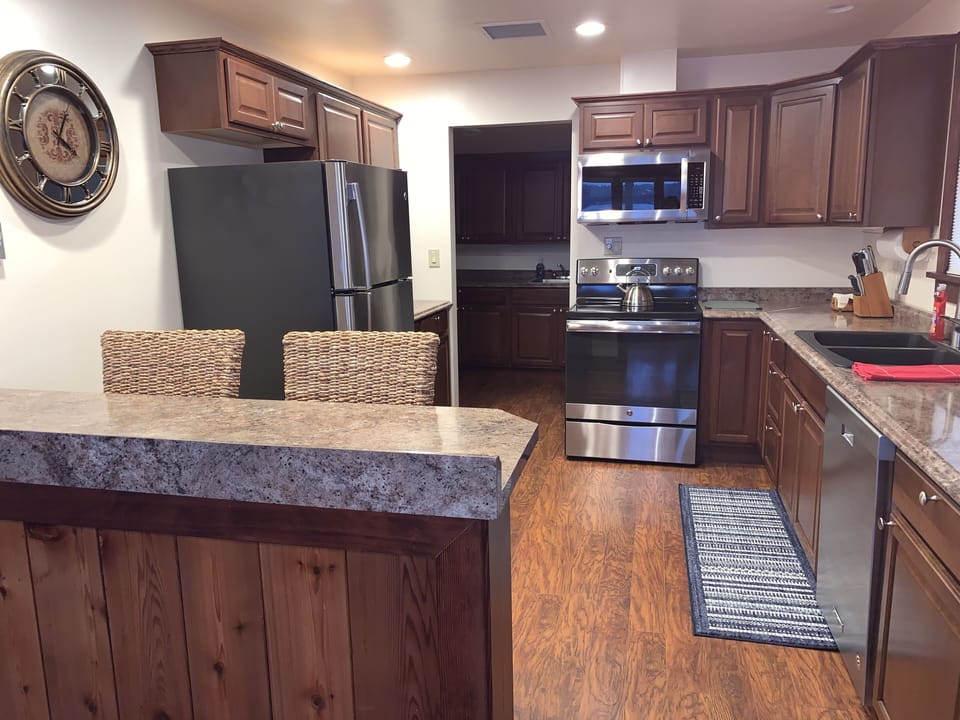Fully equipped kitchen open to dining space