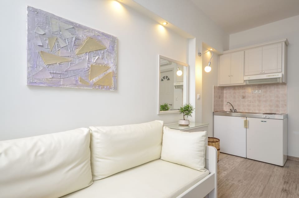 Superior Studio | Living area | Flat-screen TV