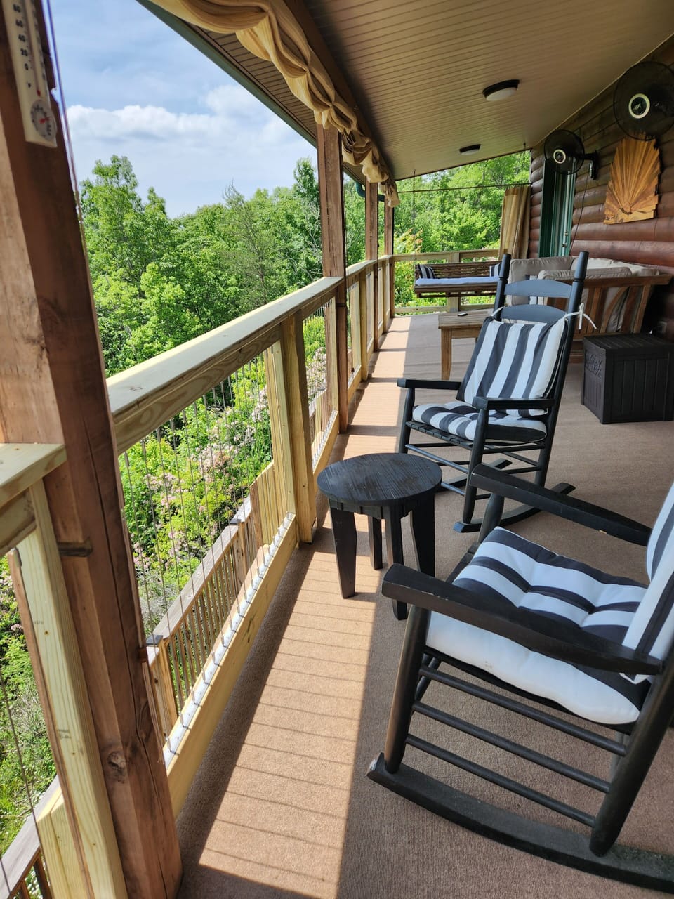 Comfortable seating on porch for relaxing and enjoying the view!
