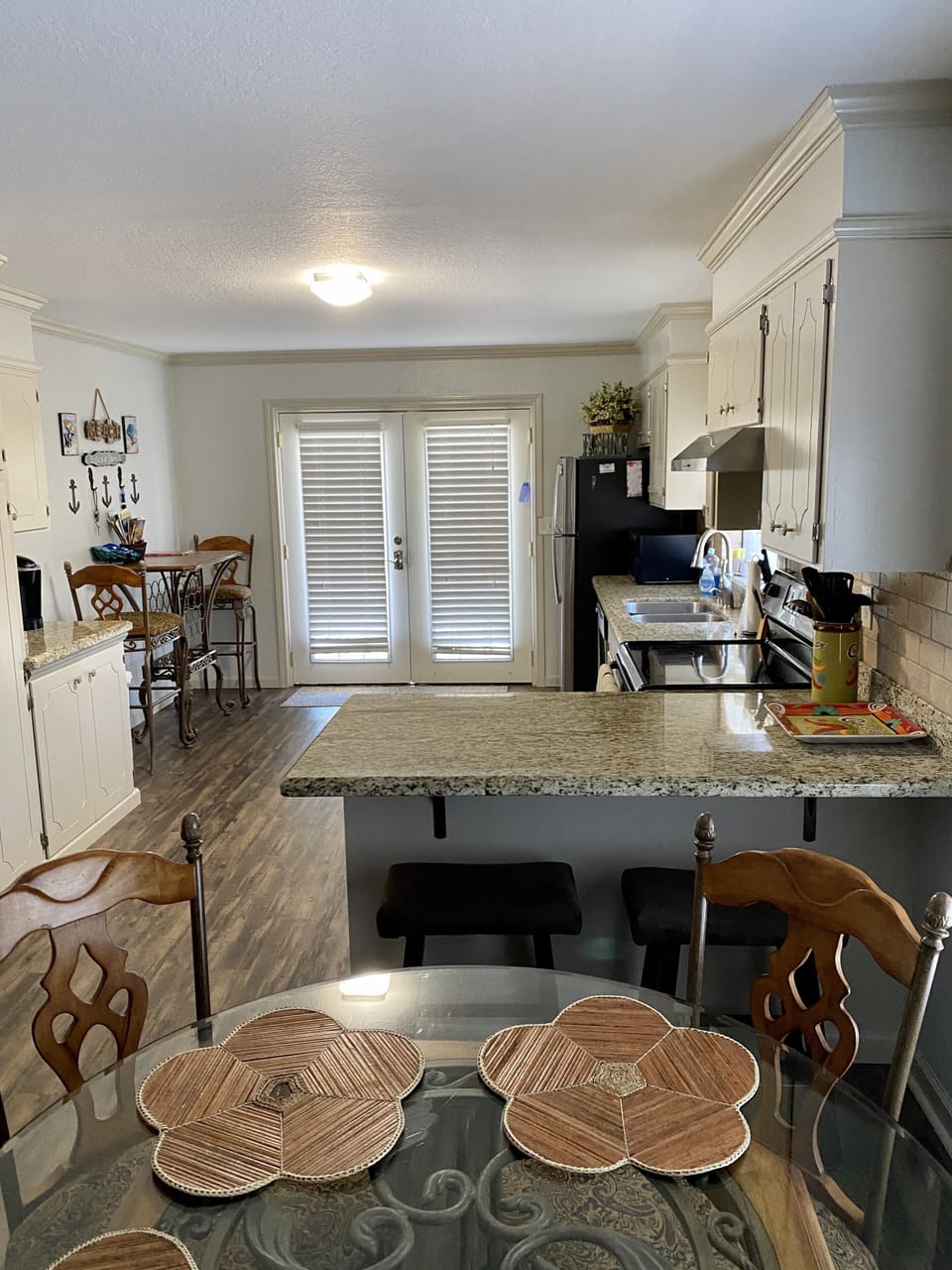 Front entrance through kitchen