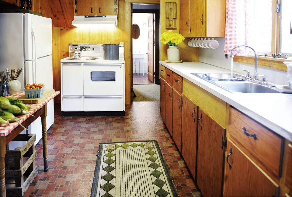 The kitchen has been updated with a professional Wolf gas range (not pictured)