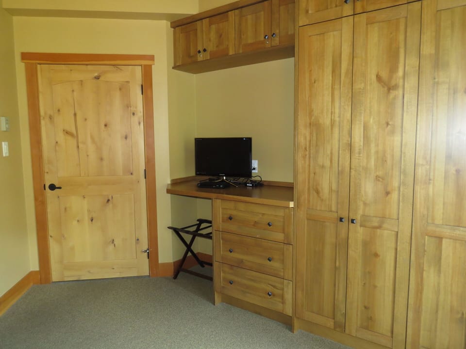 Desk station and TV in master bedroom.