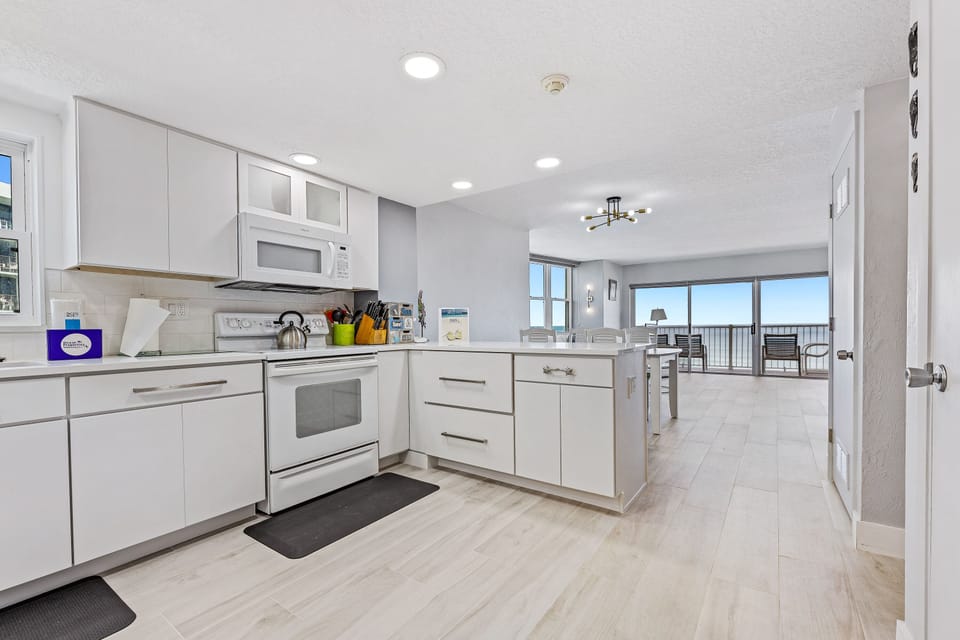 Fully updated kitchen with a lovely ocean view.