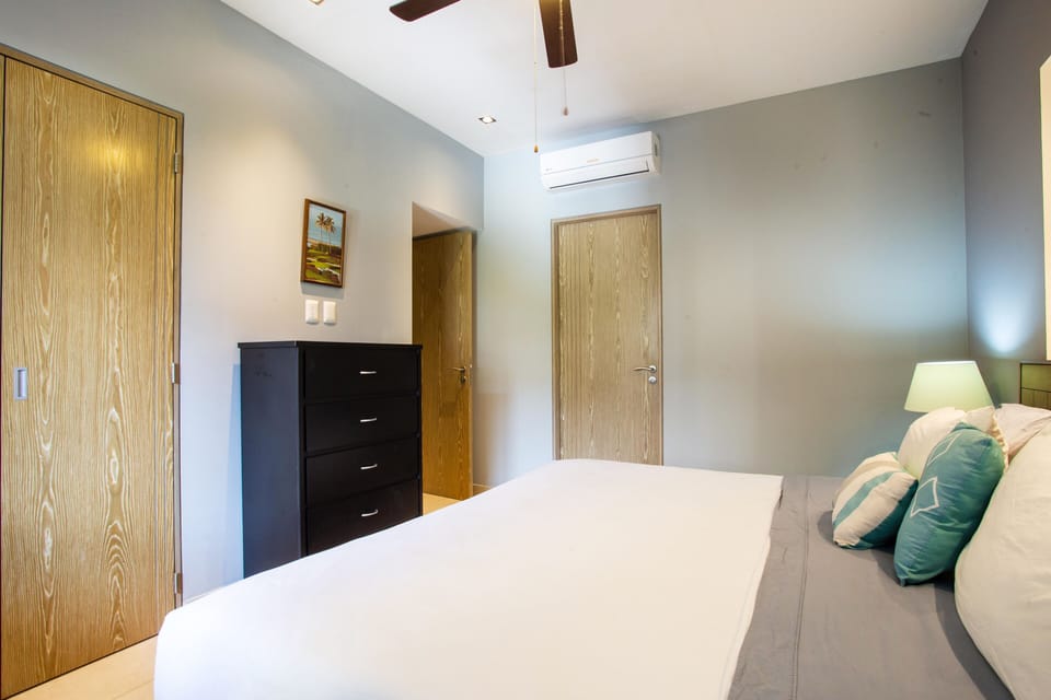 Bedroom includes an ensuite bathroom, ample closet, safe and air conditioning