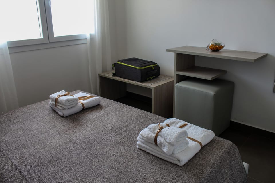 Economy Room | Blackout drapes, soundproofing, bed sheets