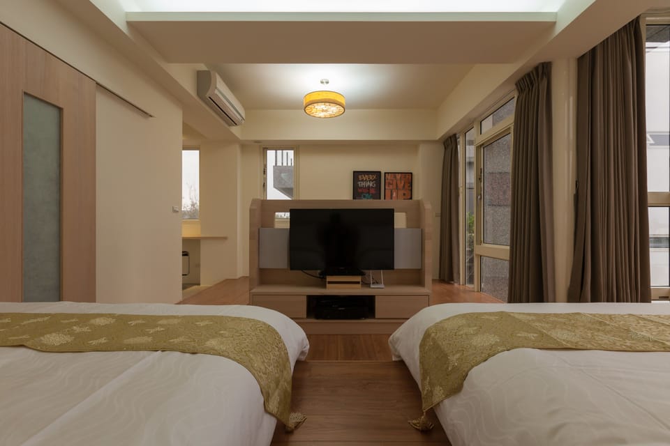 Family Quadruple Room, 2 Double Beds, Courtyard View, Courtyard Area (R204) | Down comforters, minibar, individually decorated, laptop workspace