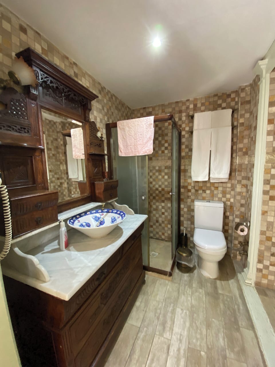 Shower, free toiletries, hair dryer, slippers