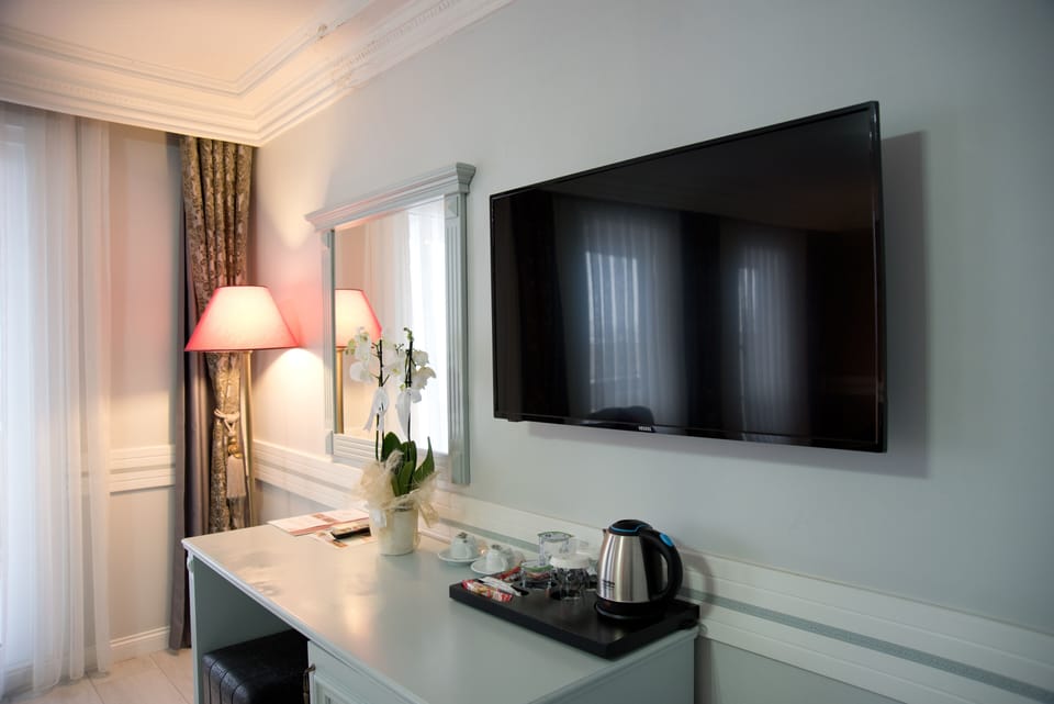 Suite, Balcony, Sea View | Premium bedding, minibar, in-room safe, individually decorated