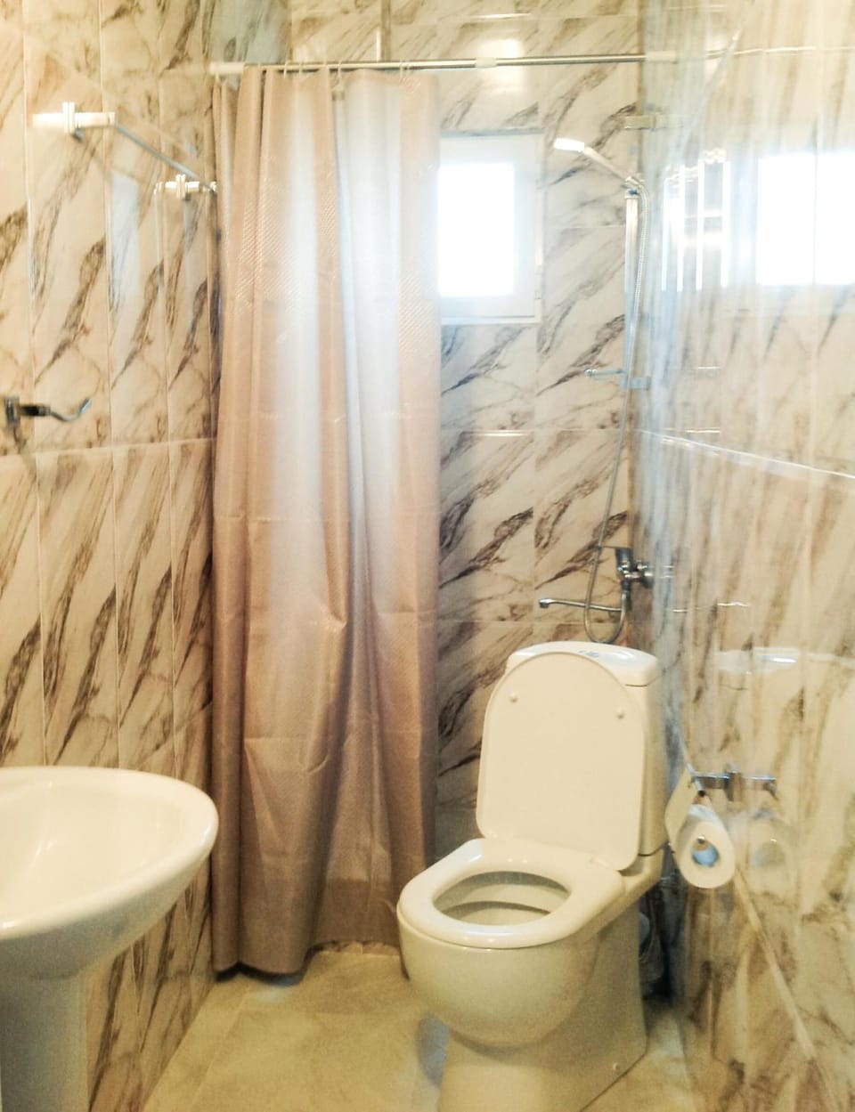 Shower, free toiletries, hair dryer, slippers