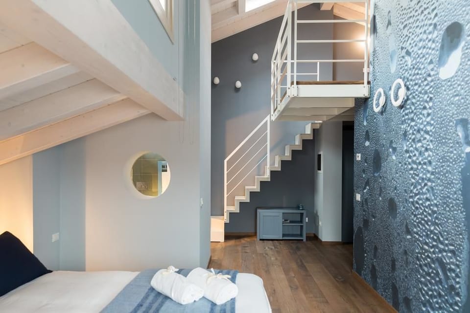 Suite (Acqua) | Minibar, in-room safe, blackout drapes, soundproofing