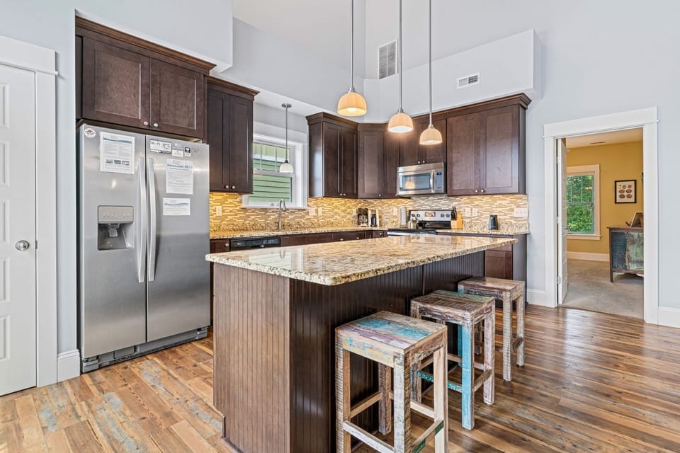 Kitchen with Island Seating on Second Level