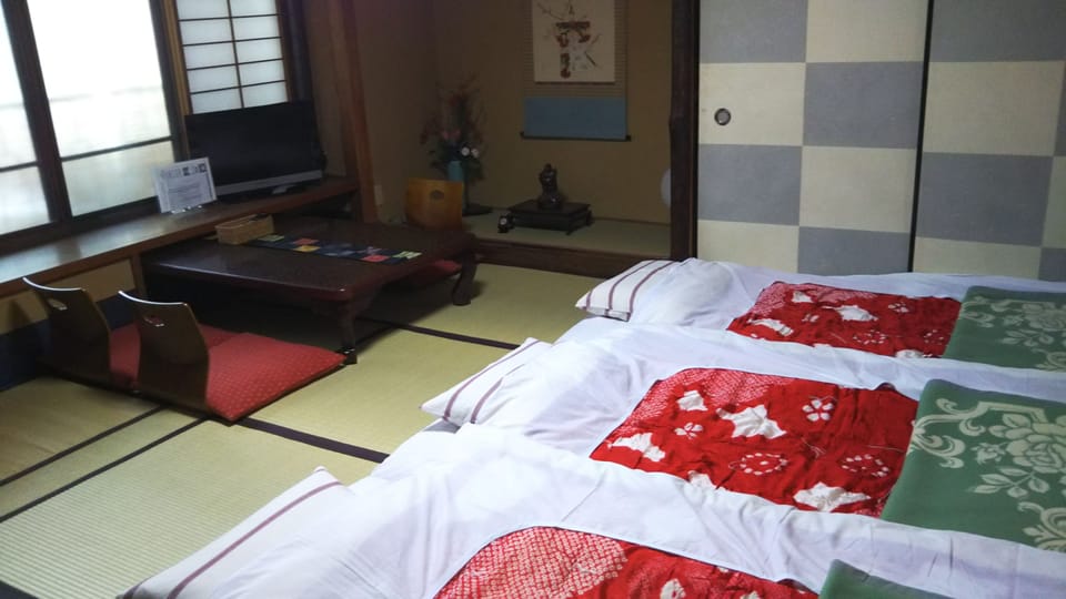 Japanese-Style Triple Room - Please contact the property if check in time will be later than 7PM. | Blackout drapes, iron/ironing board, free WiFi, bed sheets