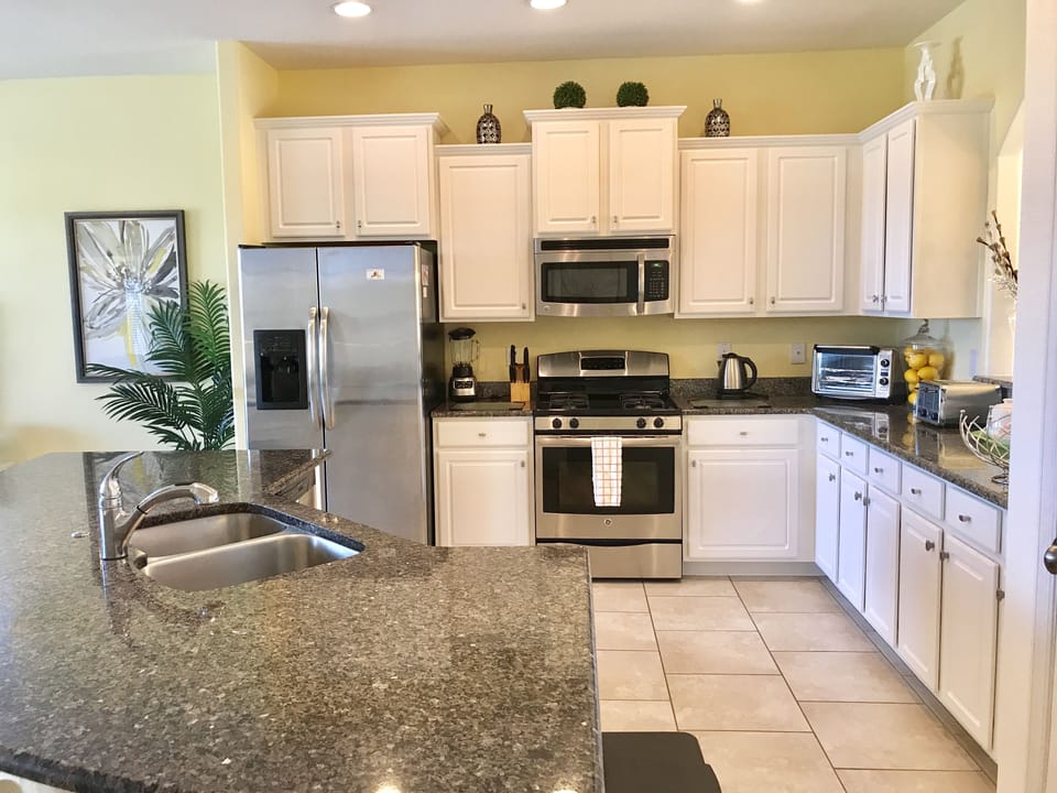 Bright and modern kitchen with spacious breakfast bar