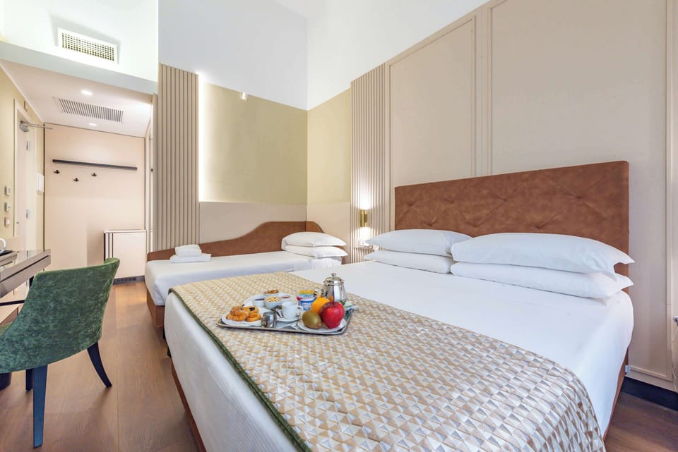 Standard Triple Room, Multiple Beds | Minibar, desk, rollaway beds, free WiFi